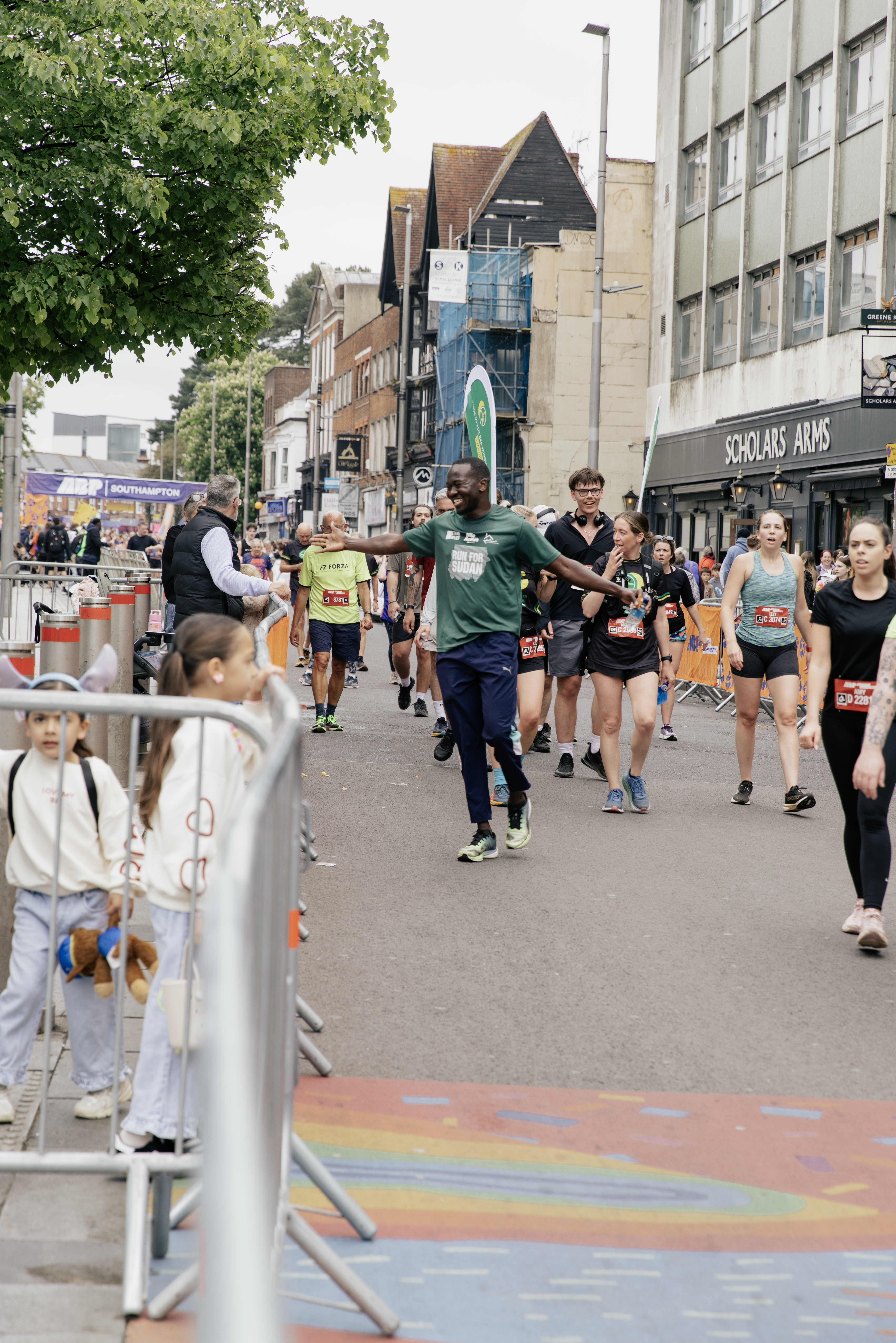 Run for Sudan finish area with runners and spectators